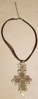 Goldtone cross dark brown leather adjustable necklace.