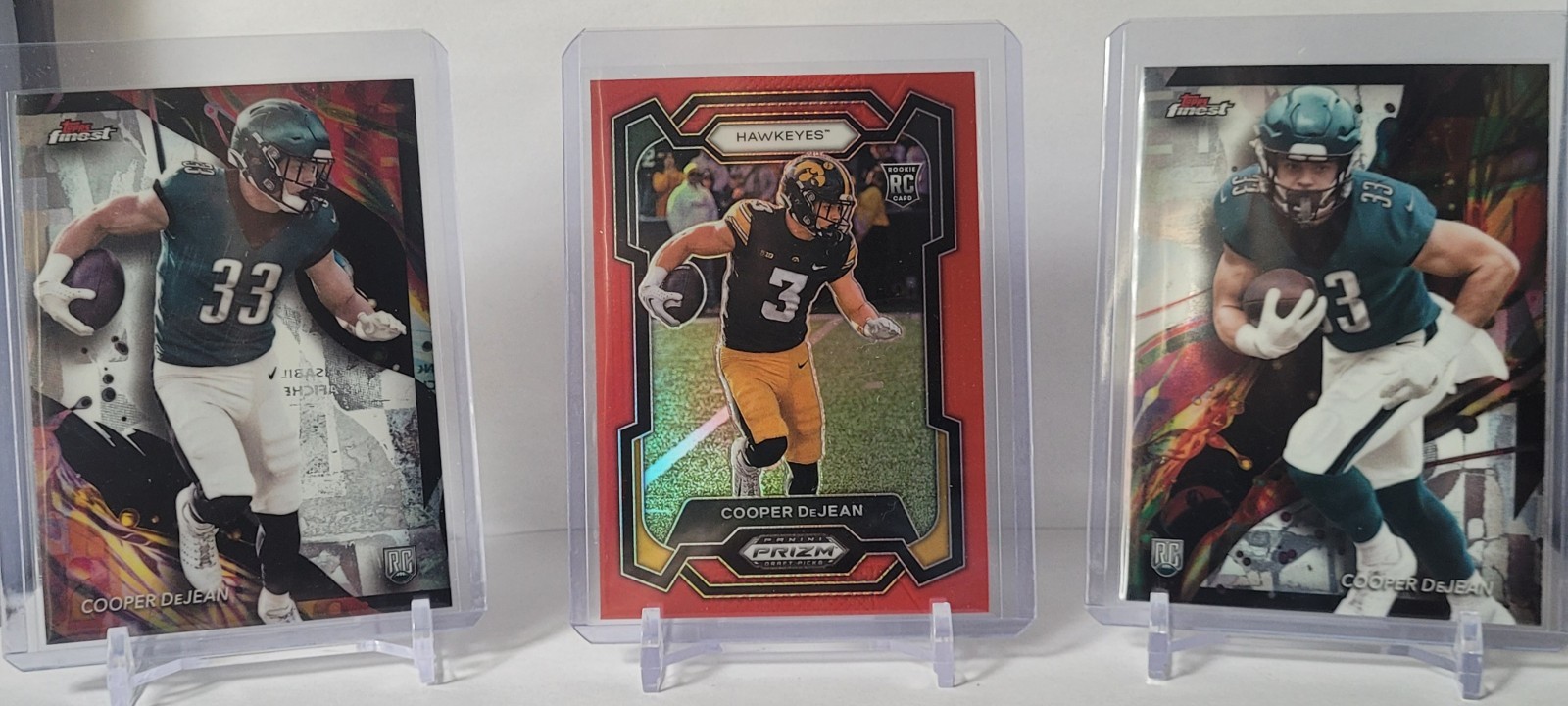 2024 Panini Prizm Draft Picks - Red Prizm #113 Cooper DeJean /299 (RC) + Finest