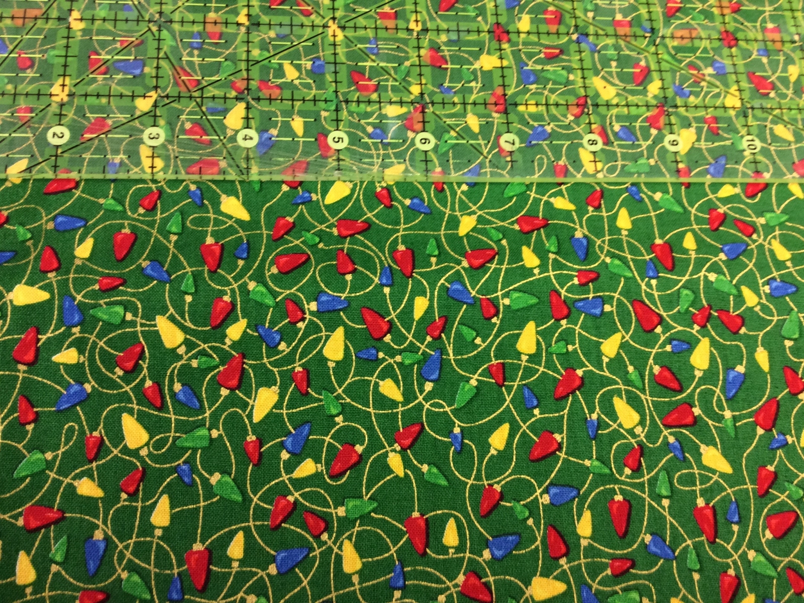 Fabri Quilt 103329 Seasons Greetings Christmas Lights On Green 100