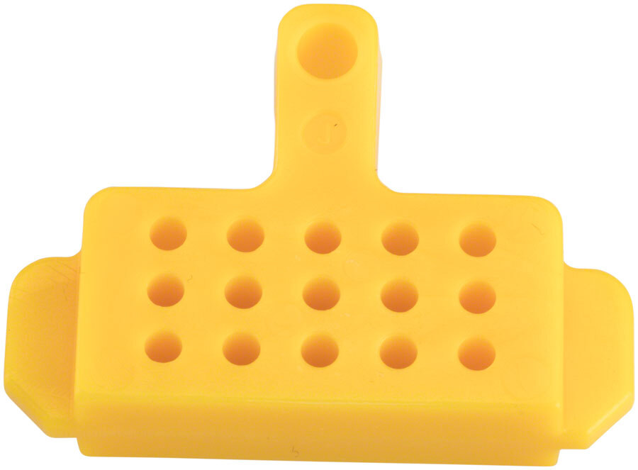 Суппорт дискового тормоза Shimano Deore BR-M6000 с желтой пластиковой прокладкой для отвода воздуха