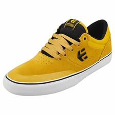black and yellow etnies