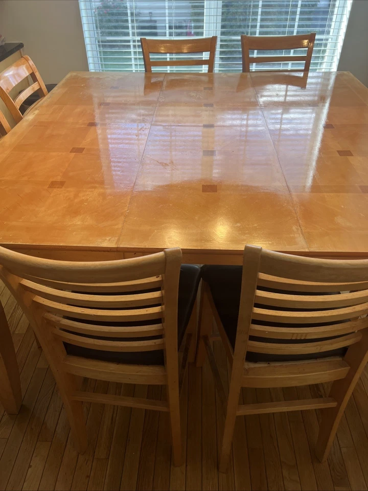 Juego de mesa de comedor de 9 piezas con hoja y 8 sillas de comedor. Foto 2 de 4