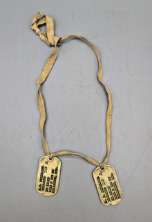 WWII/2 US Army pair of early war NOK dog tags on cloth S.C. or S.G.? Emmerling