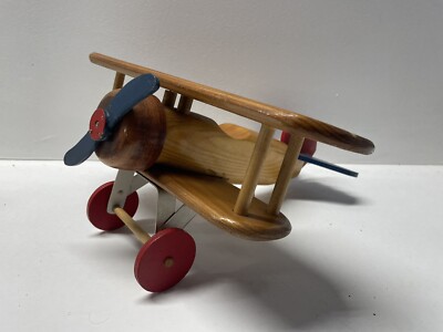 Vintage wooden airplane toy Handmade with Red wooden wheels, Blue-red Propeller