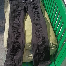 black newly bought stacked denims