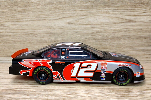 Team Caliber #12 Jeremy Mayfield Mobil 1 25th Anniversary Ford Taurus Bank 1:24 - Picture 2 of 9