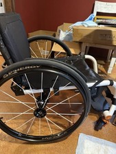 New In Box Tilite Rigid Frame Wheelchair With Free Cushion.