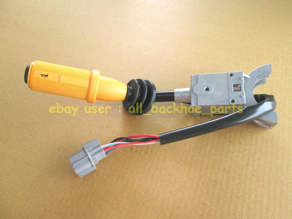 Retroexcavadora JCB - INTERRUPTOR DE COLUMNA DELANTERA Y TRASERA (N.º DE PIEZA) 701/52601) Foto 2 de 4