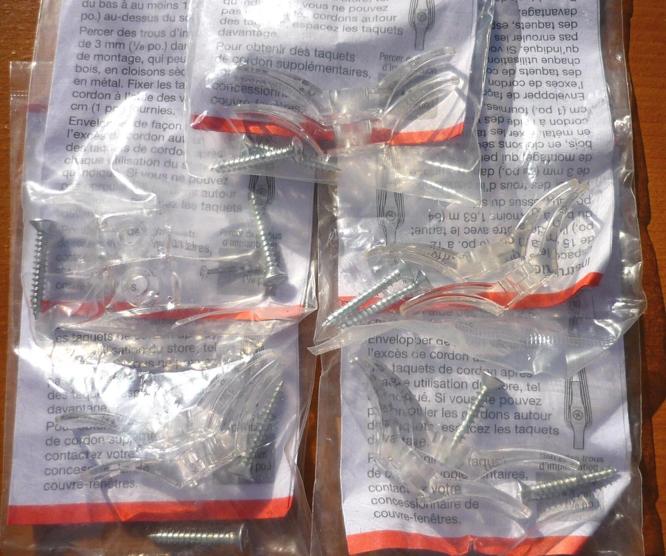 CANTIDAD de (10) tacos de cable transparente de seguridad para niños con tornillos de montaje - Hunter Douglas Foto 2 de 2