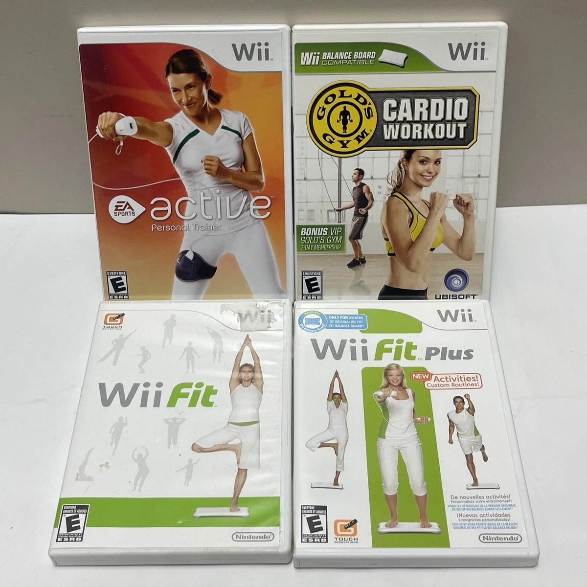 Wii Exercise Video Game Lot Of 4 Wii Fit Plus Golds Gym Cardio Workout EA  Active