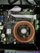 Barebones ECS A300AM4 AM4 MITX Thin Motherboard in X100 case with CPU cooler. 