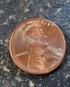 2021 Penny , on LIBERTY the letters LI & on STATE the letters STA are  light #5