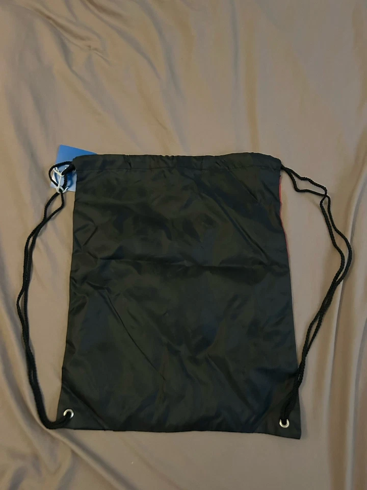 BOLSO CON CORDÓN RYAN HUNTER-REAY DHL EXPRESS NEGRO PUERTO Y COMPAÑÍA Foto 2 de 3