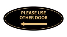 Oval Please Use Other Door Left Arrow Sign Black Gold - Medium 2.75x7"