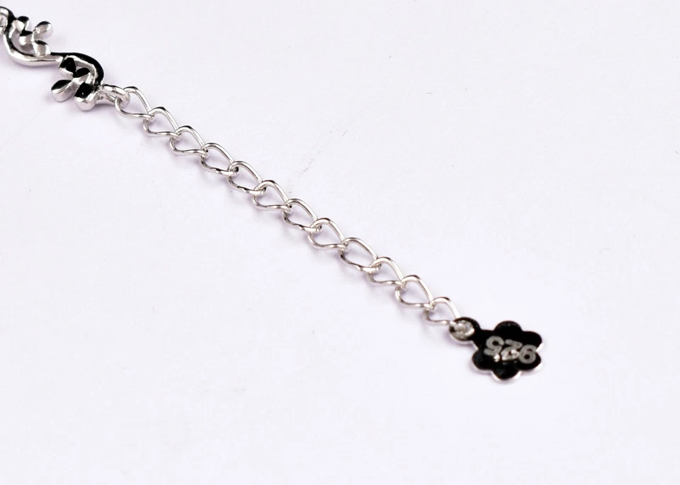 Pulsera artesanal de plata de ley 925 con diseño de ocho piedras preciosas de circón Foto 2 de 4