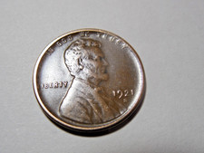 1921 S Lincoln Cent, in about  VF  condition.  Good coin.  But you decide!!!!!