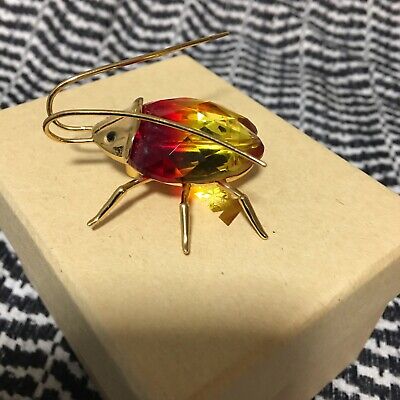 DANIEL SWAROVSKI PARIS PARADISE 18K GP AMAZAR FIRE OPAL DANIEL SWAROVSKI PARIS PARADISE 18K GP AMAZAR FIRE OPAL