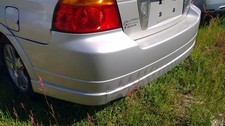 Rear Bumper Sedan Fits 02-03 Suzuki Aerio Oem