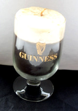 guinnes candle in half pint glass never used in VGC