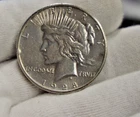 1928 US Peace Silver Dollar $1 Key Date XF (Cleaned, Rim Nicks)