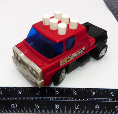 Vintage Thomas Salter Auto Transport Truck Red TOMY Sears Push Button Toy 70's