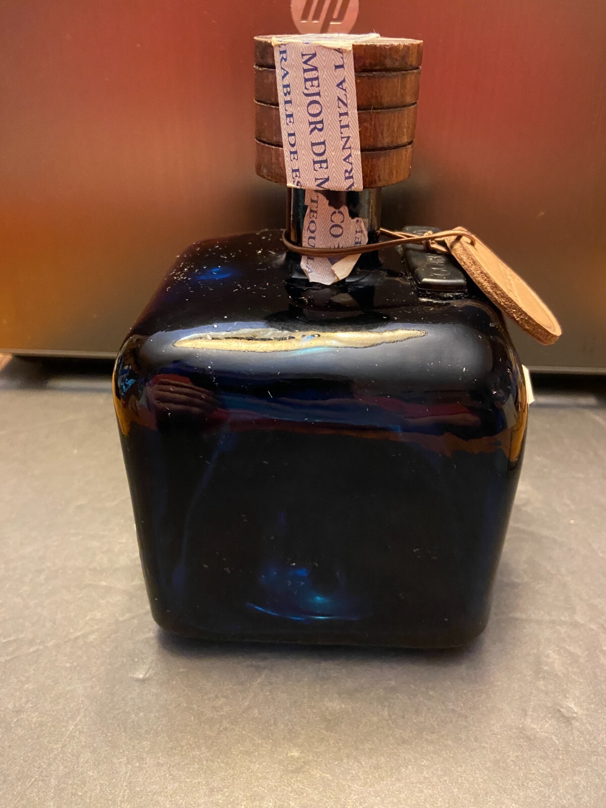 Los Arango special edition cobalt blue leather label tequila bottle