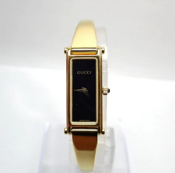 [Presque comme neuve] Montre à quartz femme vintage GUCCI 1500 cadran noir doré du JAPON