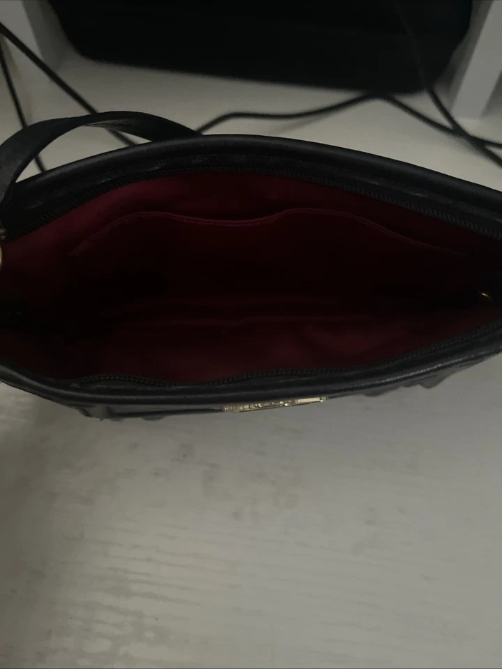 Mini bolso sin asas Coach de cuero negro accesorio de viaje vintage Foto 4 de 4