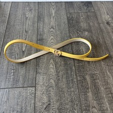 Slim yellow polyurethane belt with rose gold buckle