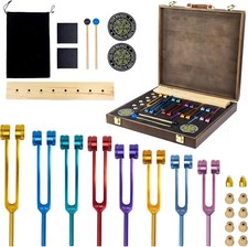 8-piece tuning fork chakra kit with wooden/glass bases, activator and storage