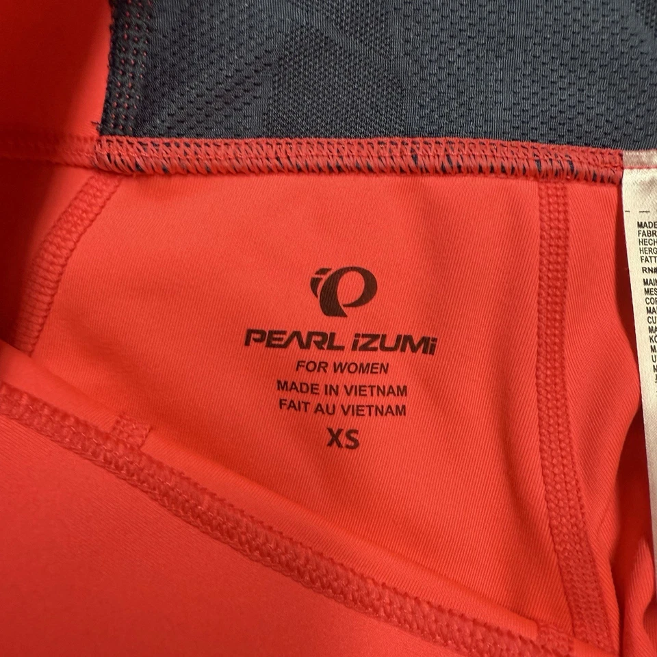 Leggings capri Pearl Izumi Wander para mujer XS rosa coral negro entrenamiento activo Foto 2 de 4