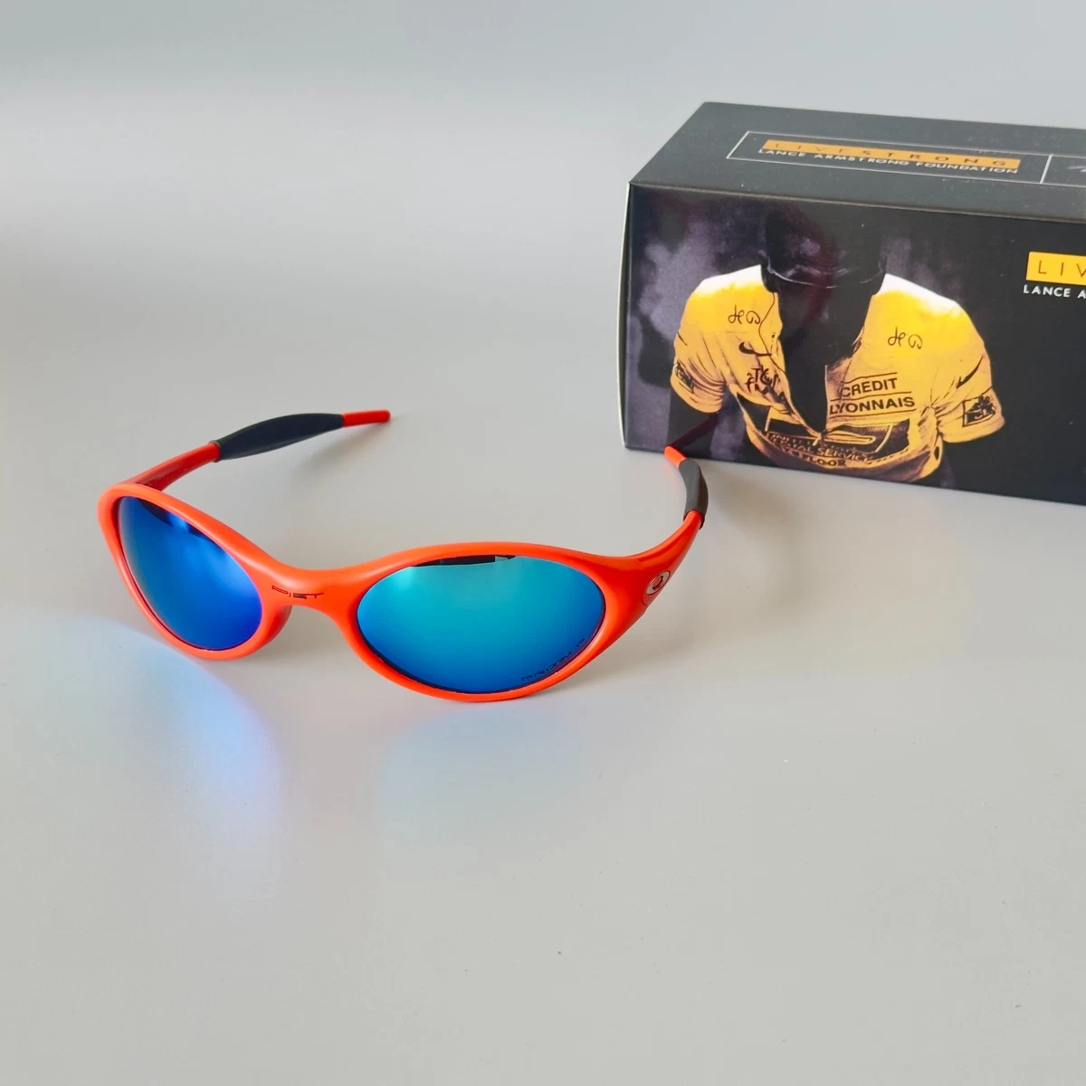 Oakley Eye Jacket Redux / PIET Sunglasses Orange Frame / Blue
