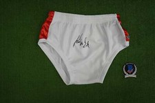 KEVIN VON ERICH SIGNED WHITE WRESTLING TRUNKS BAS COA