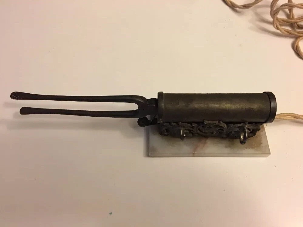 Electric marcel curling iron top