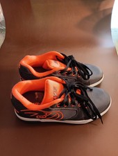 Zapatos de patinaje sobre ruedas Heelys Propel 2.0 negros/naranja jóvenes talla 7