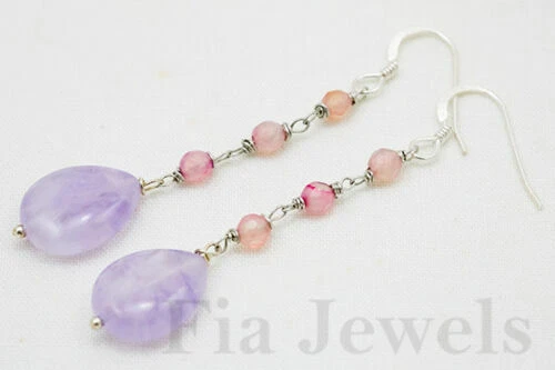 Orecchini di lusso con gemme viola