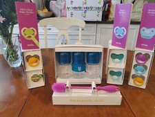 Lot of Smilo Bottles And Pacifiers and bottle brush