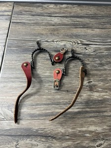 Black Steel Twisted Spurs Red Leather