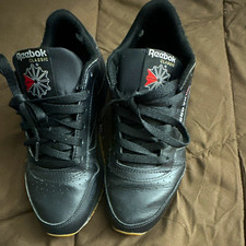 Reebok Classic Men s Low Top Lace-Up Athletic Sneaker, Solid Black Rubber