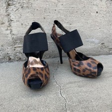 Leopard print peep toe heels with black strap