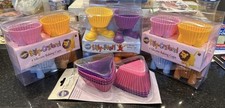Wilton Silcone Baking Cups Set Of Four NIB