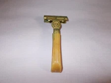 Vintage Schick Razor With Bake Lite Handle Metal Brass