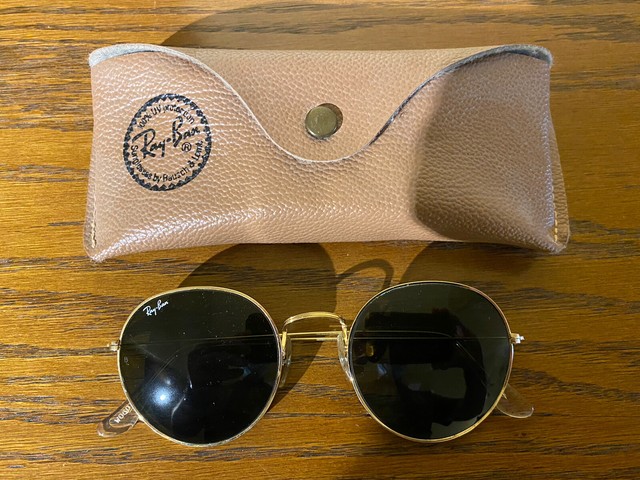 ray ban round sunglasses black and gold