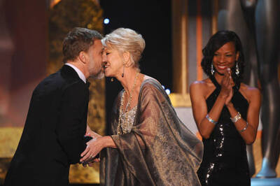 Actor Christoph Waltz actress Helen Mirren onstage at the TNT/TBS - Old Photo
