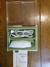 Vintage 'Sears Best' Electric Scissors, Model No. 344.2199. Green and white.