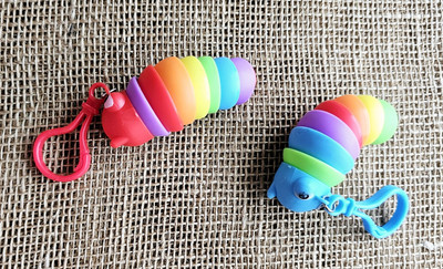 Lot Of 2 Articulating Sensory Finger Slugs  Multicolor Backpack Charms