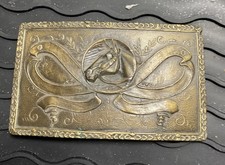 Vintage Indiana Metal Craft X36 western Belt Buckle Horse in Ribbons Award type