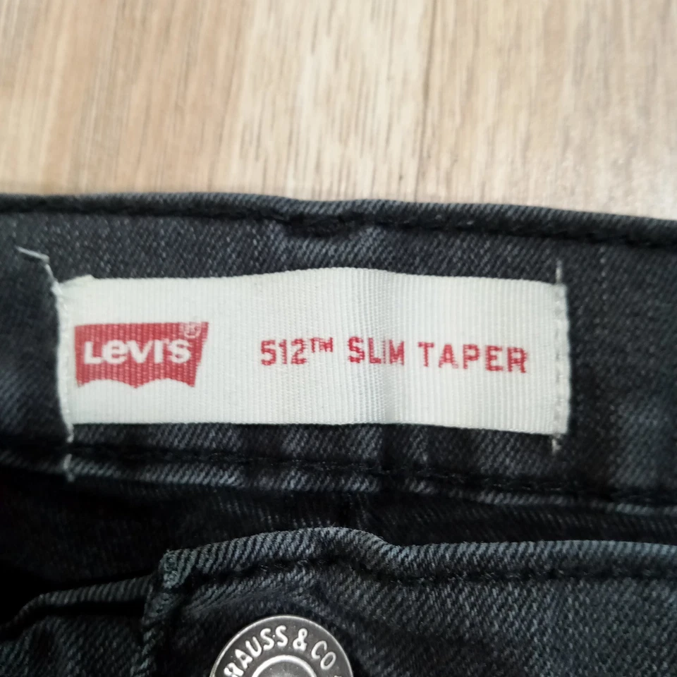 Pantalones de mezclilla ajustados Levi's 512 para niños lavado oscuro talla 18 regular W29 L29 Foto 2 de 4