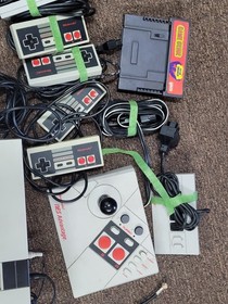 NES Console Bundle With 8 Controllers, NES Advantage, 4 Way, And 30 Games