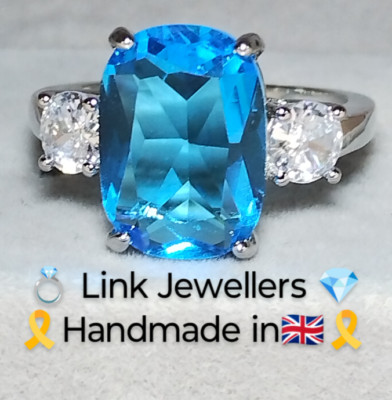 DA: Woman 825 Silver Ring. Size N-O.  Emerald Cut Aquamarine & Simulated Beryl